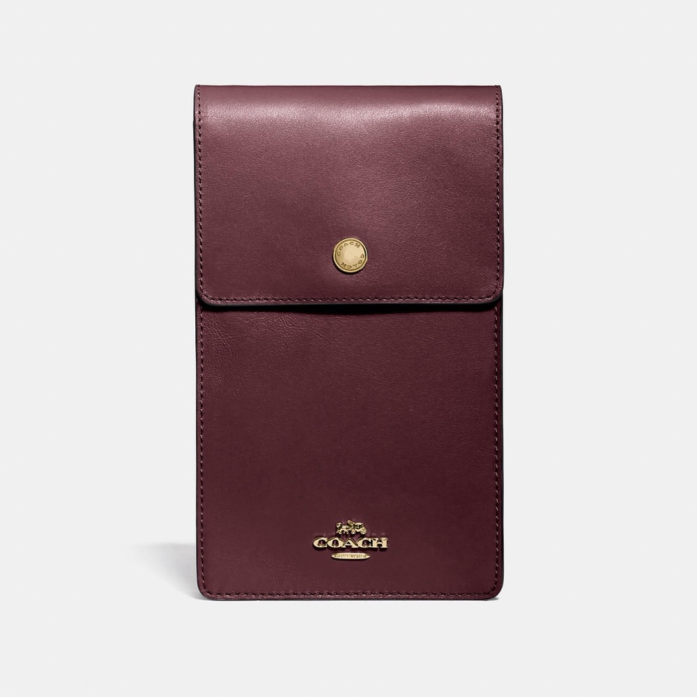 Mauve COACH New York Vintage Crossbody bag for small electronics